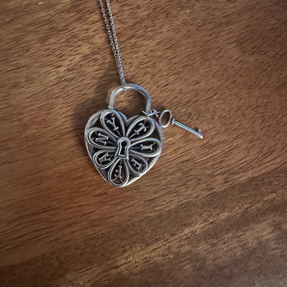 Tiffany & Co.Filigree Heart with Key Pendant Necklace.